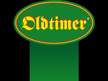 Oldtimer Logo in Grün mit gelber Schrift auf ovalem Hintergrund.